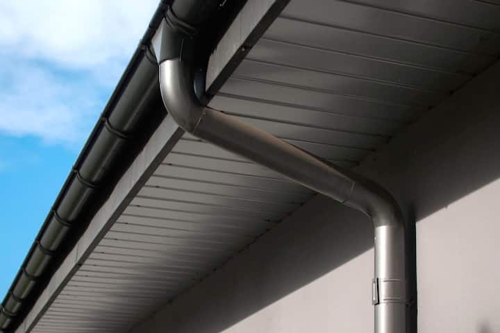 Corrosion-resistant galvanized gutters installed on a commercial building in Myrtle Beach